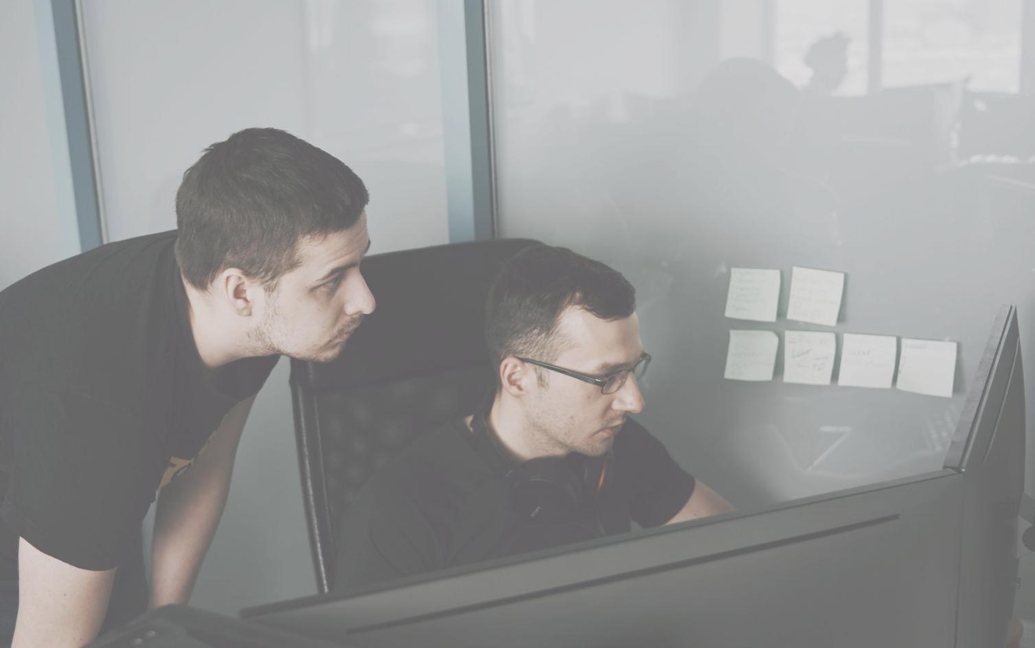 Finance professionals collaborating on budget forecasting and strategic planning